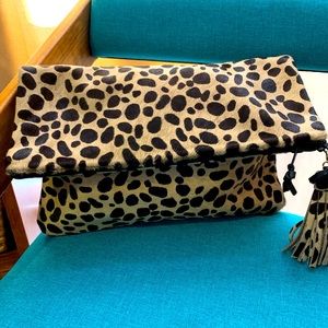 The loveCortnie foldover leopard clutch